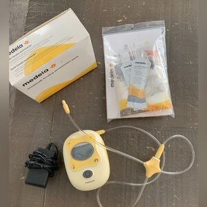 Medela Freestyle Pump with Yellow and Cream Accents